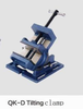 Tilting clamp for drilling machine